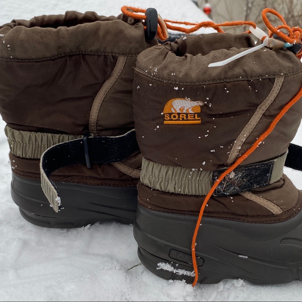 Sorel snow boots for a toddler boy